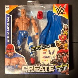 WWE Hulk Hogan Action Figure with Blue Cape & Red Mask